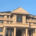 江苏黄金麻别墅外墙干挂石材效果示例