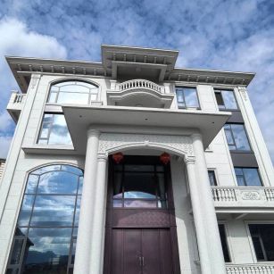 江苏白麻别墅外墙干挂石材效果示例