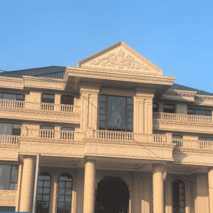 江苏黄金麻别墅外墙干挂石材效果示例